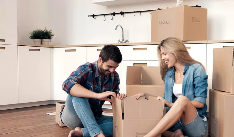 couple packing a box