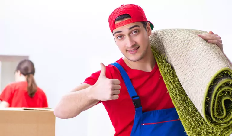young professional showing thumbs up