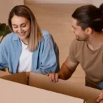 couple packing up their household for a move