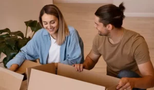 couple packing up their household for a move